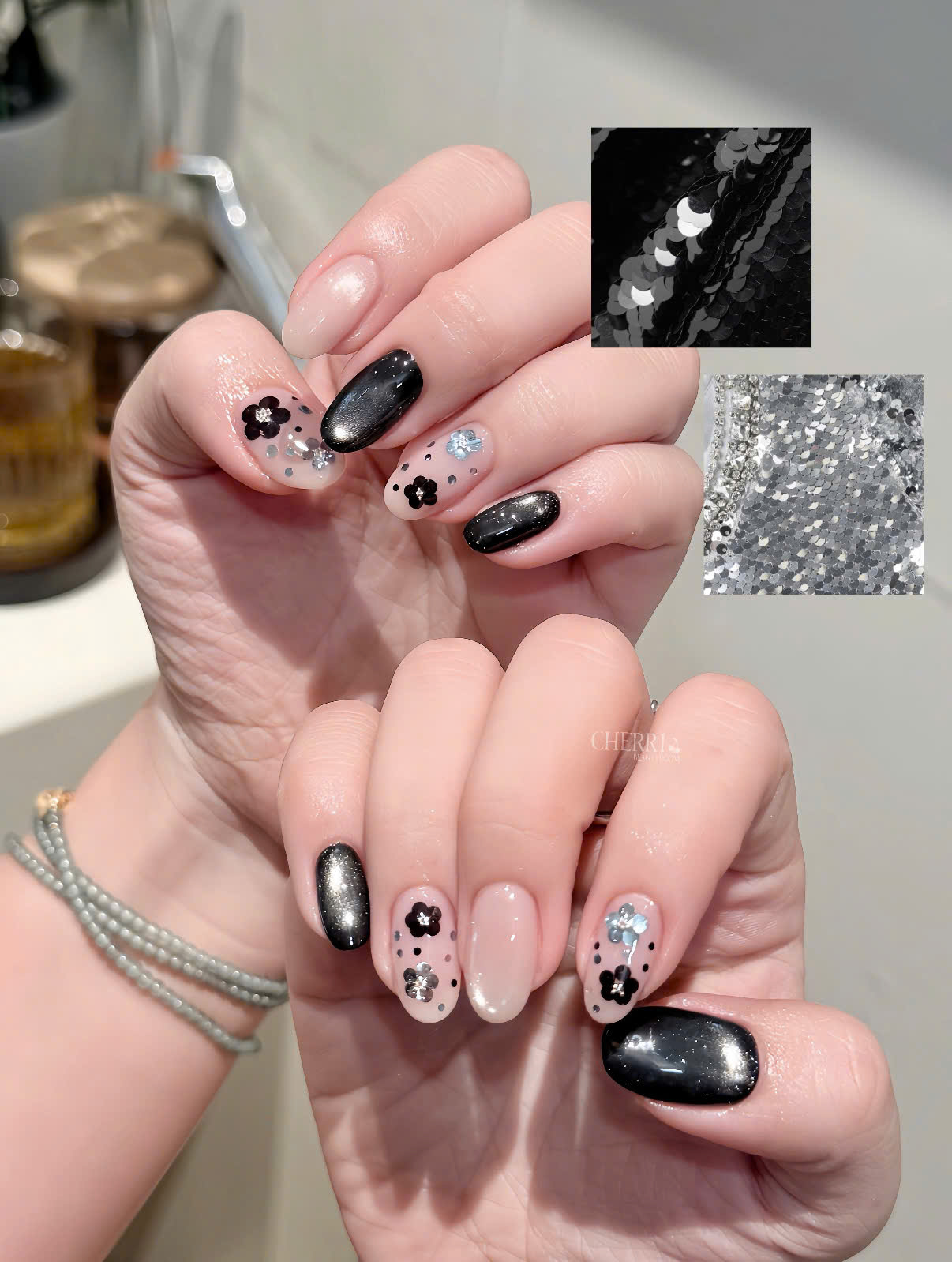 Mẫu nail hoa đen bạc lấp lánh tại Cherri Beauty Room